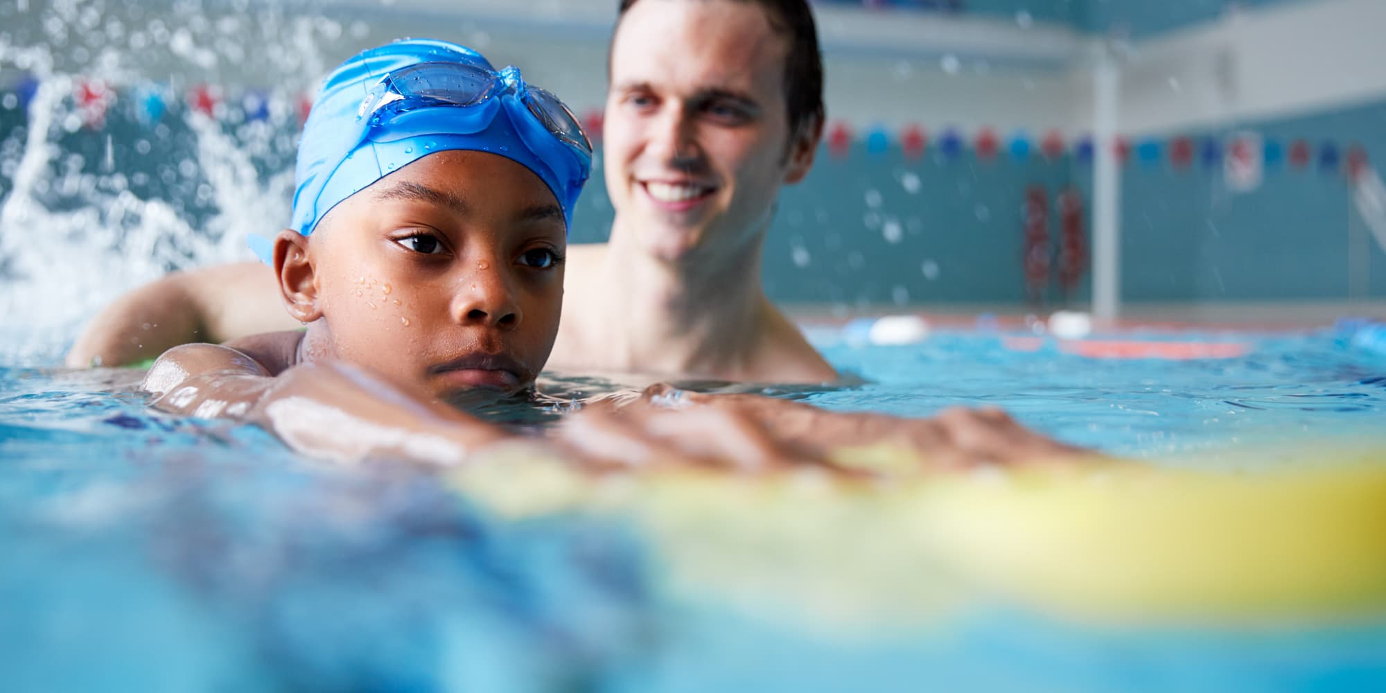 over-3-lessons child in pool