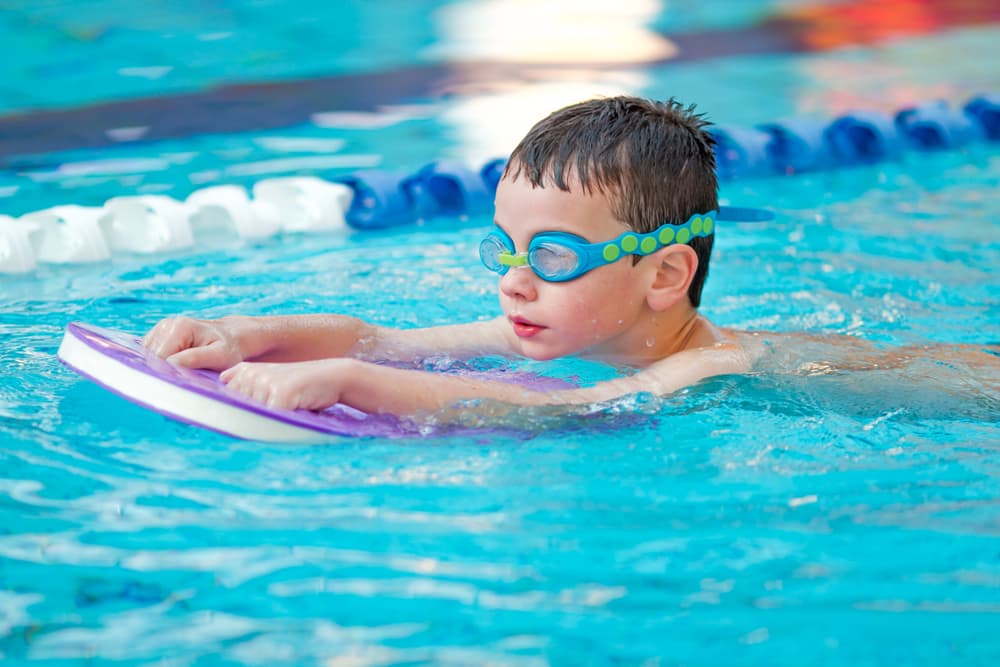 child on a swimming lesson